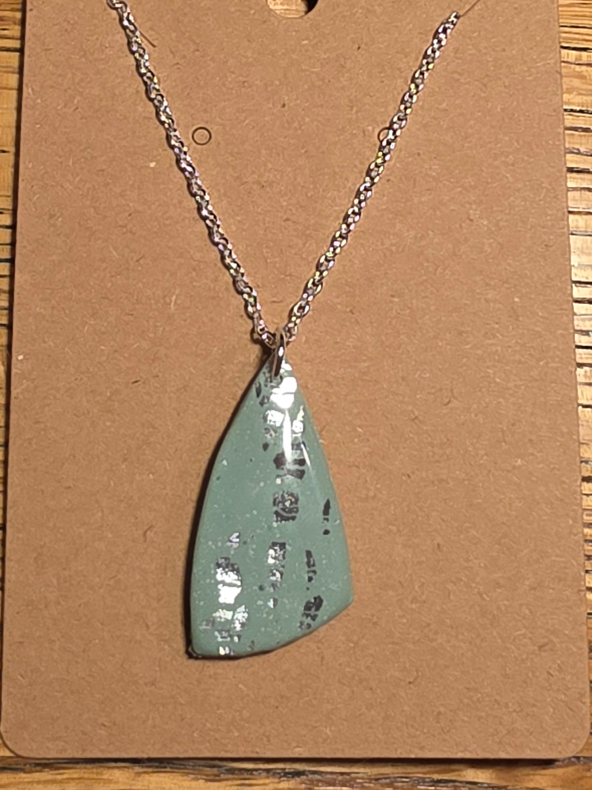Eucalyptus green with silver butterfly wing necklace