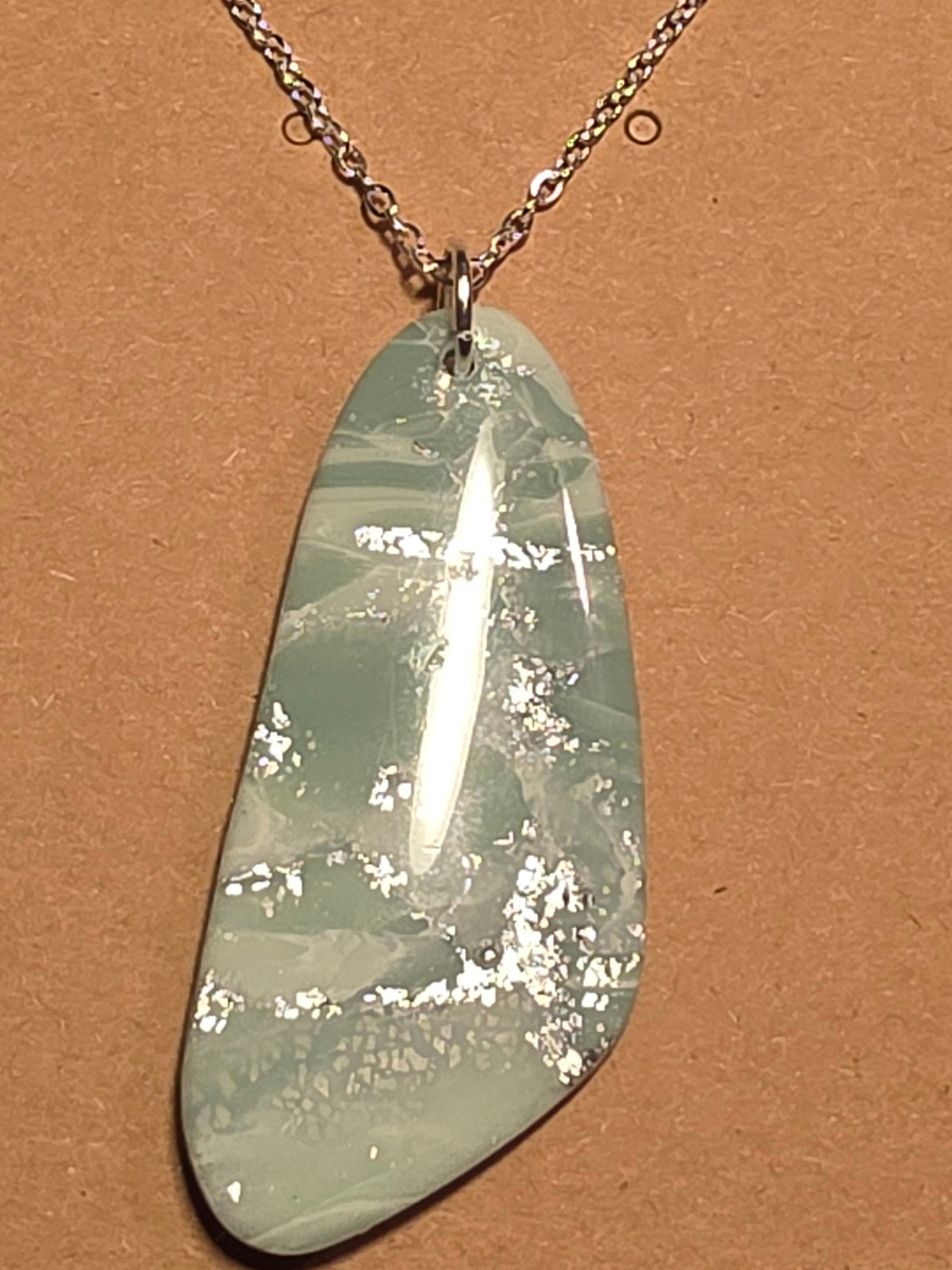 Eucalyptus green with silver butterfly wing necklace