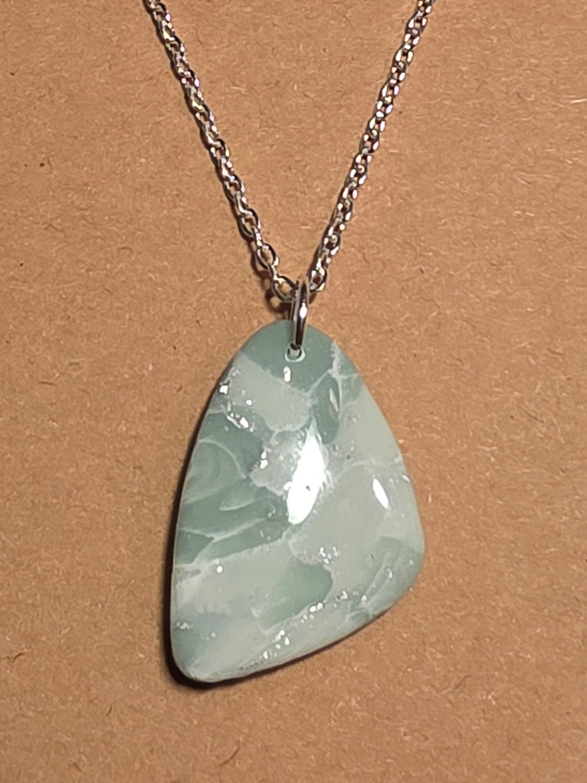 Eucalyptus green with silver butterfly wing necklace